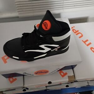 Reebok Black and White Sneakers with Orange Accents